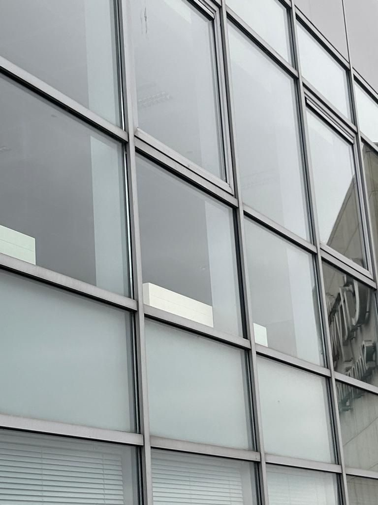 A close up of a building with a lot of windows