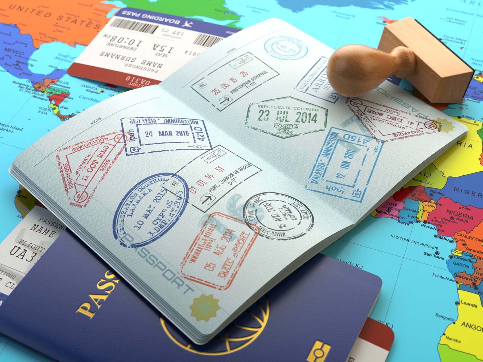 Passport open with stamps, tickets, and stamp on world map background.