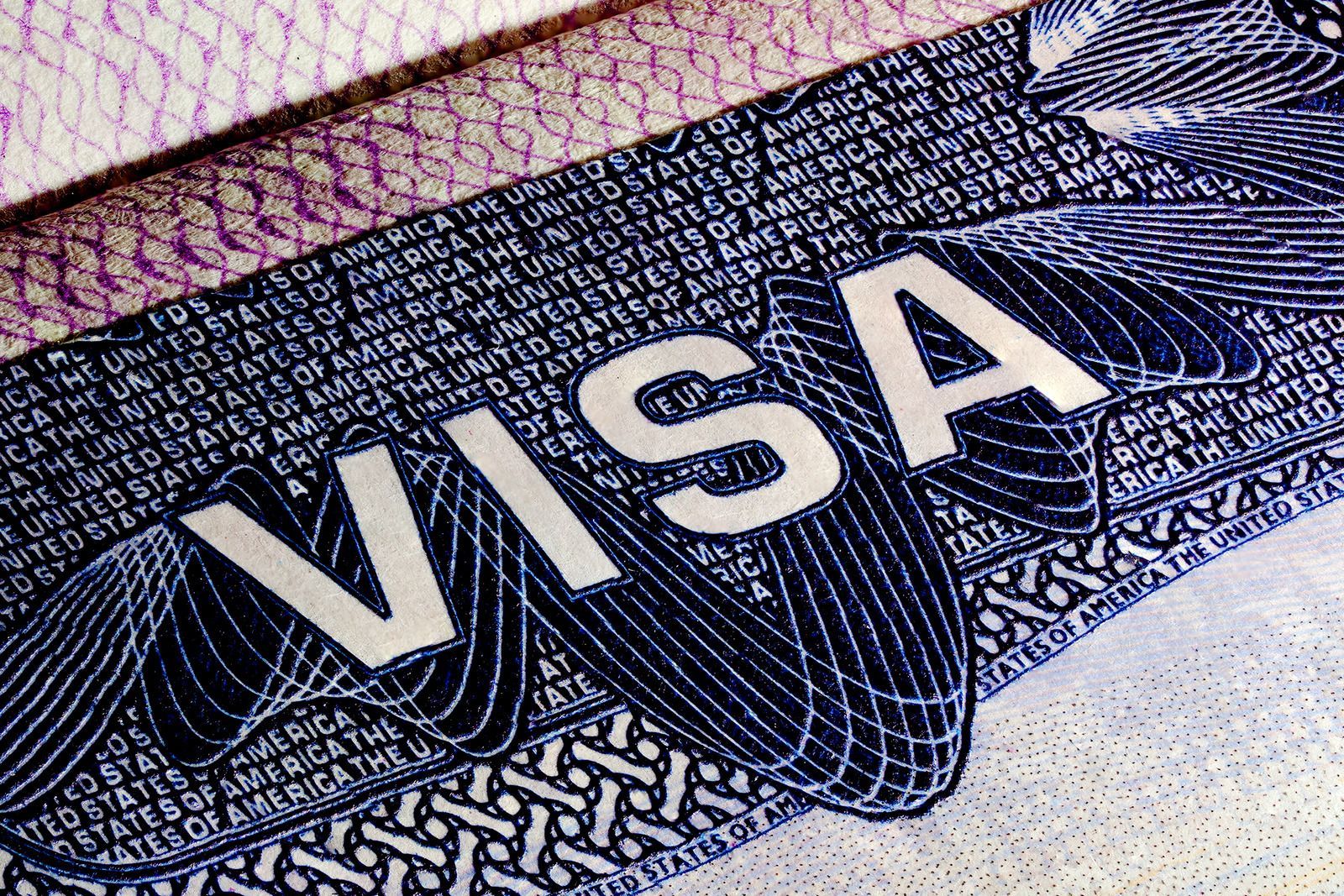 A close up of a visa on a piece of paper