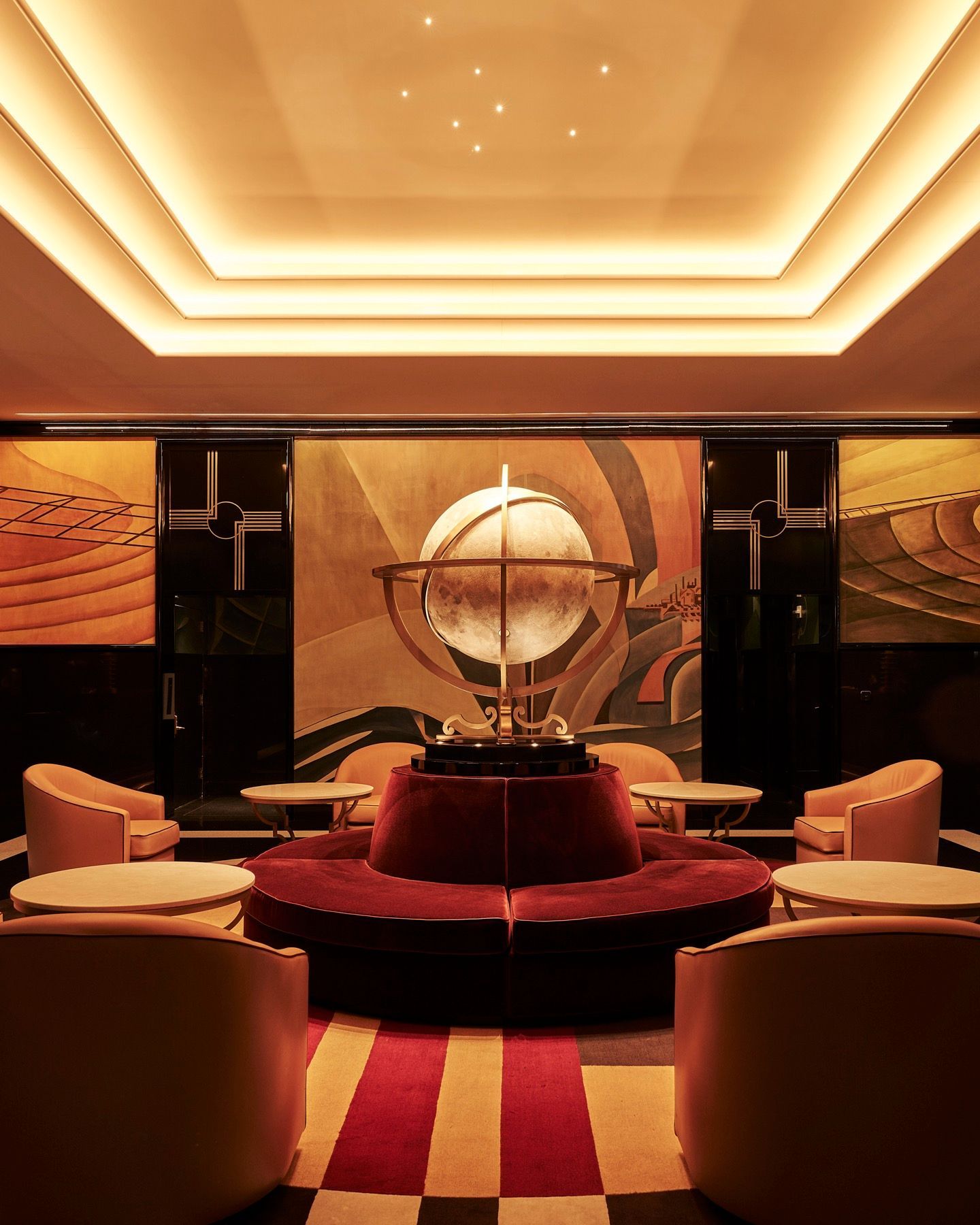 A room with a globe in the middle of it