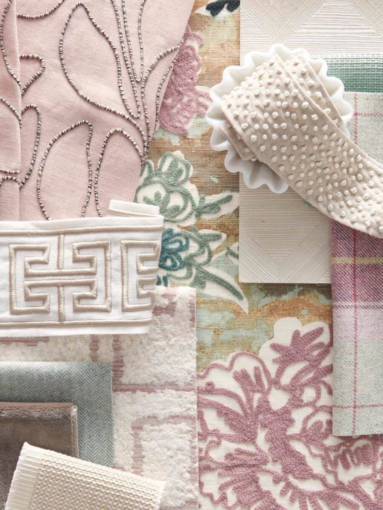 A bunch of different types of fabrics are on a table