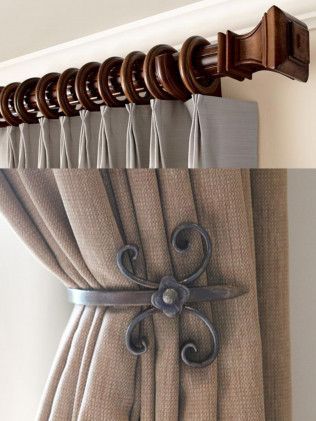 A pair of curtains with a pair of scissors attached to them.