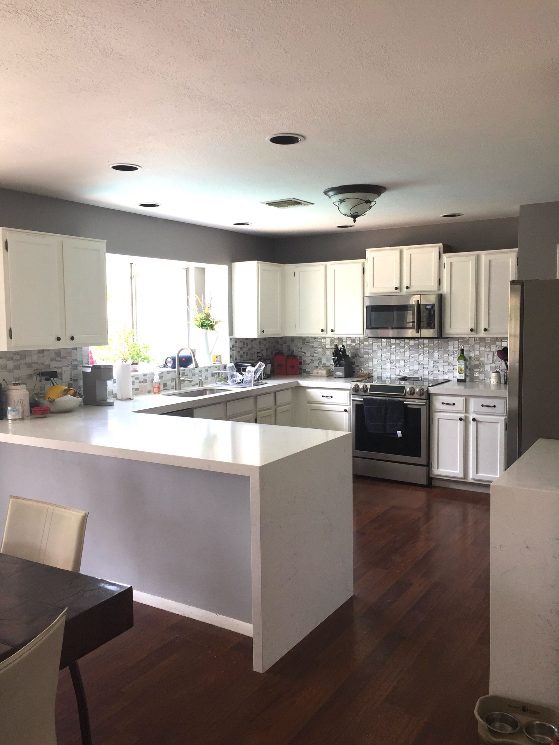 A row of houses on a sunny day in a residential neighborhood