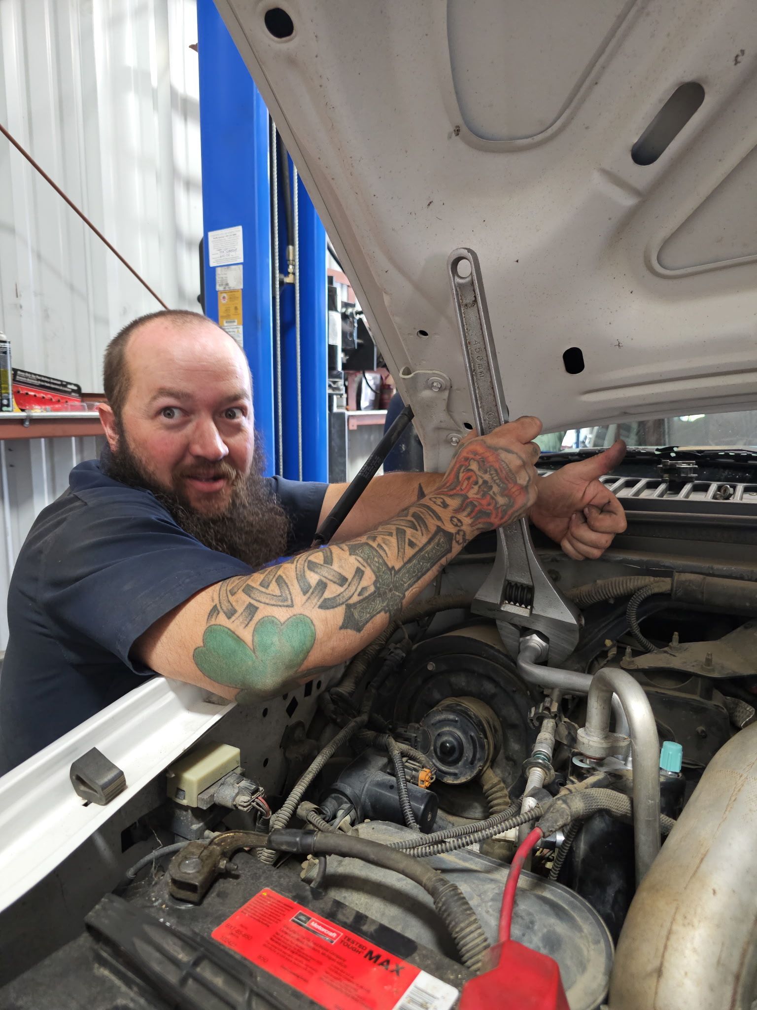 A person is driving a bmw with a navigation system.