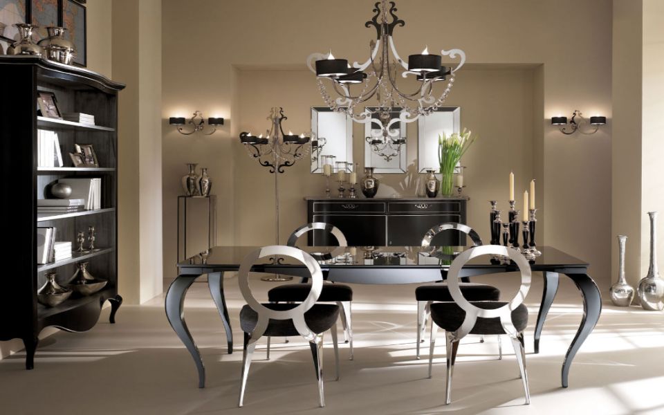sala da pranzo con arredi eleganti neri e argento