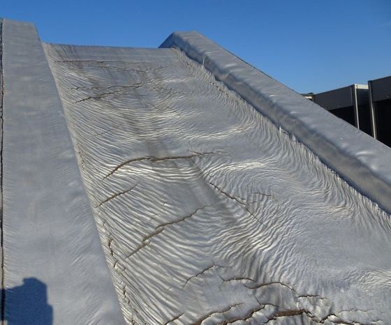 Solar reflective mastic asphalt roof
