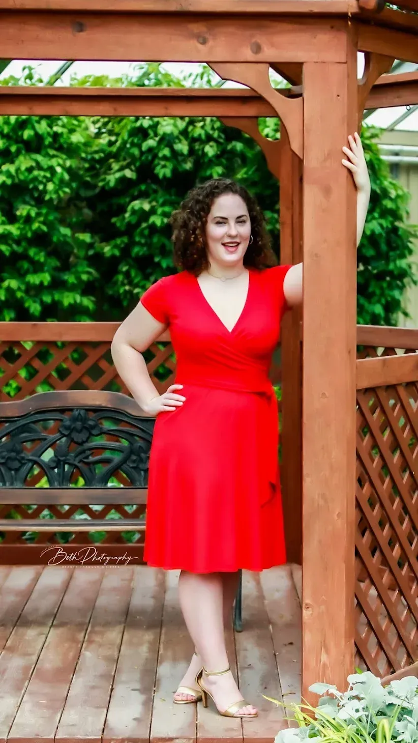Woman poses in a gazebo