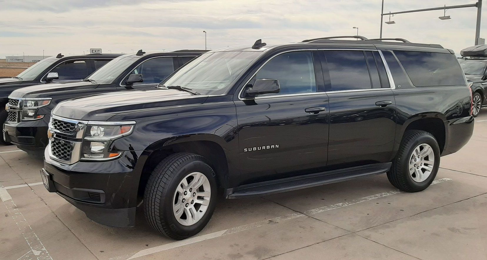 chauffeur opening the car door
