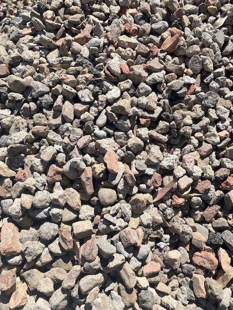 A Pile Of Gravel Is Sitting On The Ground — Dhm Sand, Gravel & Soil Supplies In Sebastopol Vic
