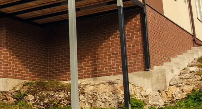 house on sloped lot with opportunity for walkout basement entrance construction