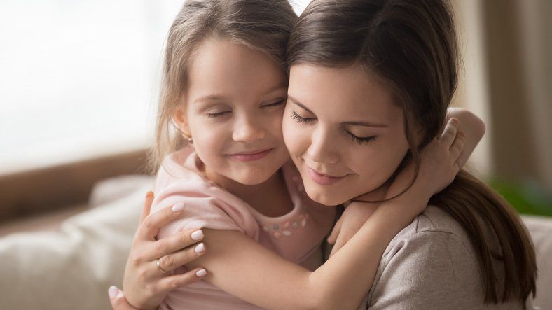 mother embrace little kid daughter feeling love connection