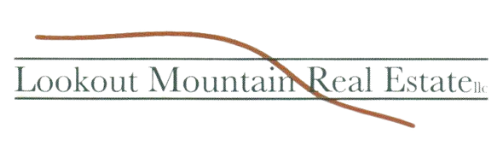 The logo for lookout mountain real estate has a red line through it.