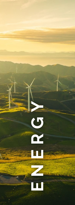 A group of wind turbines are sitting on top of a hill.