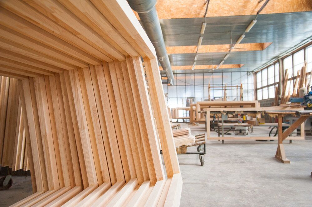 A Stack of Wooden Frames in a Factory — Flow Kitchens in Old Bar, NSW