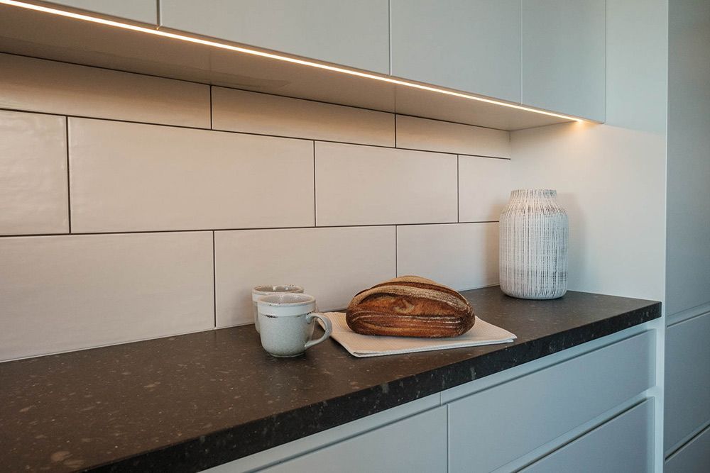 A Loaf of Bread is Sitting on a Counter in a Kitchen — Flow Kitchens in Forster, NSW