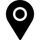 A black map pin with a white circle in the middle.