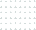 A seamless pattern of gray triangles on a white background.
