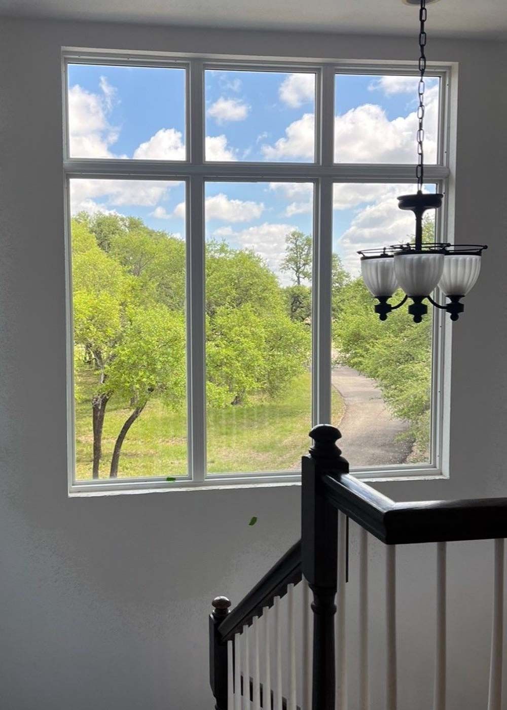 Home Stairwell Window | Showroom Windows and Doors