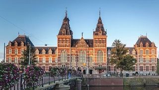 Rijksmuseum Amsterdam with flowers in front
