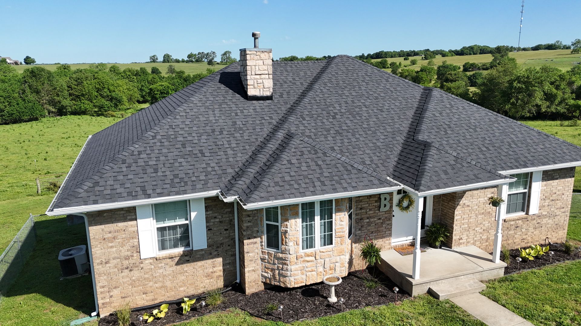 Home with new roof and siding by top exterior home contractor in Springfield, MO