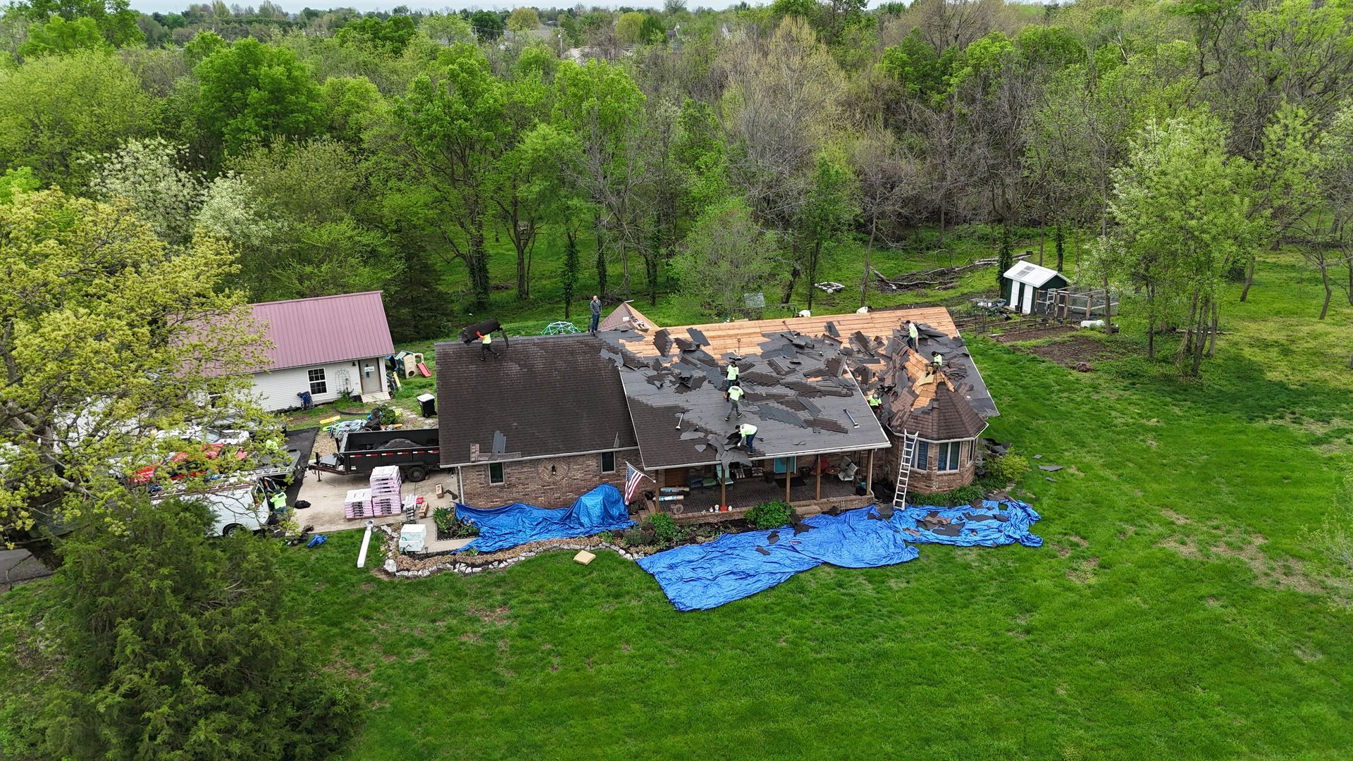 Home getting new roof by top roofing contractor in Springfield MO