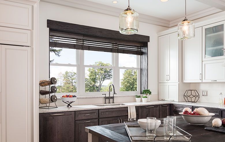 Blanket and book next to new windows installed by top window company in Springfield, MO