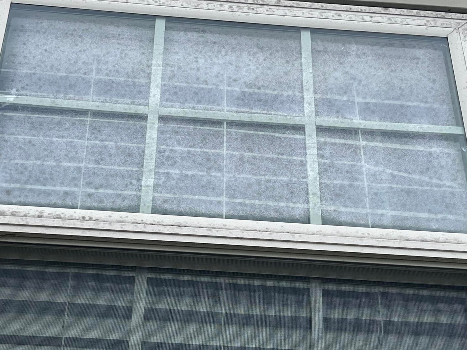 A close up of a window with a filter on it.