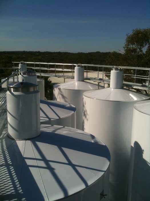a couple of tanks at sunset