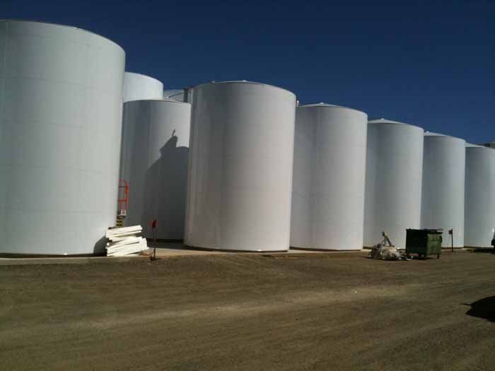 white industrial insulated tanks
