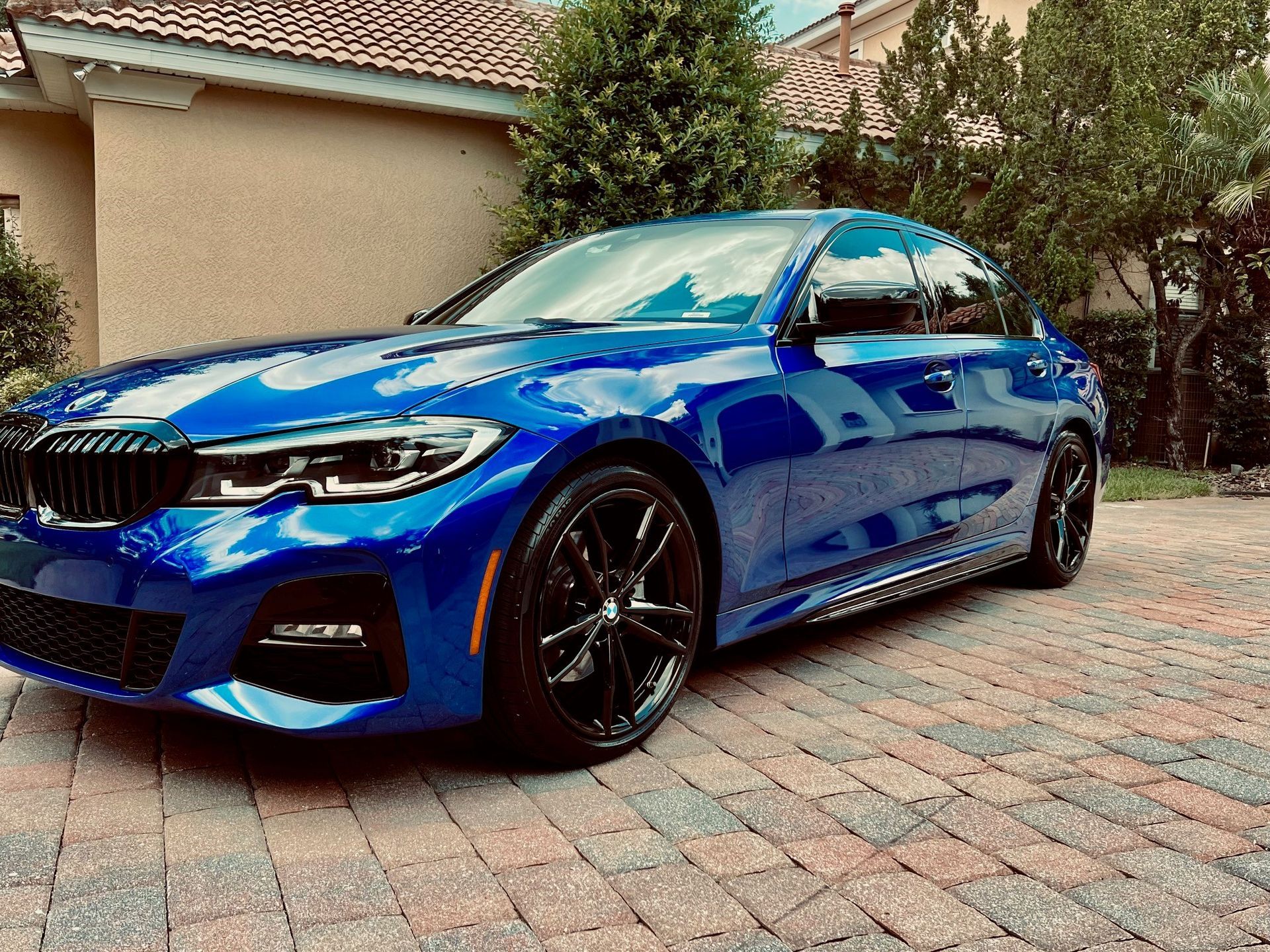 Applying Ceramic Coating To The Red Car — Tavares, FL — Resurrection Detailz