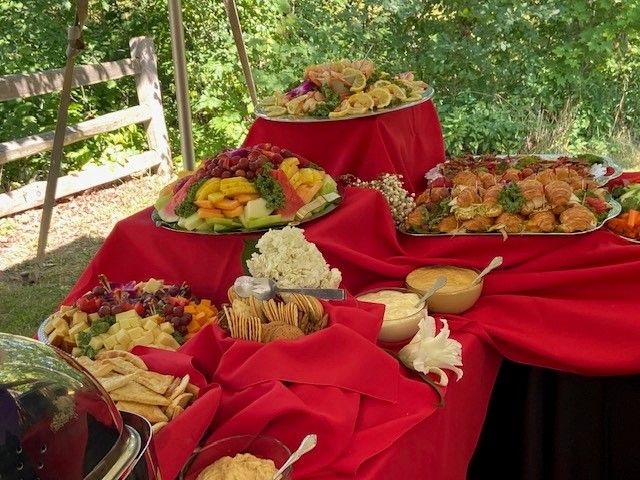 A buffet table with a lot of food on it