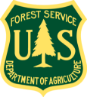Green and yellow Forest Service emblem;