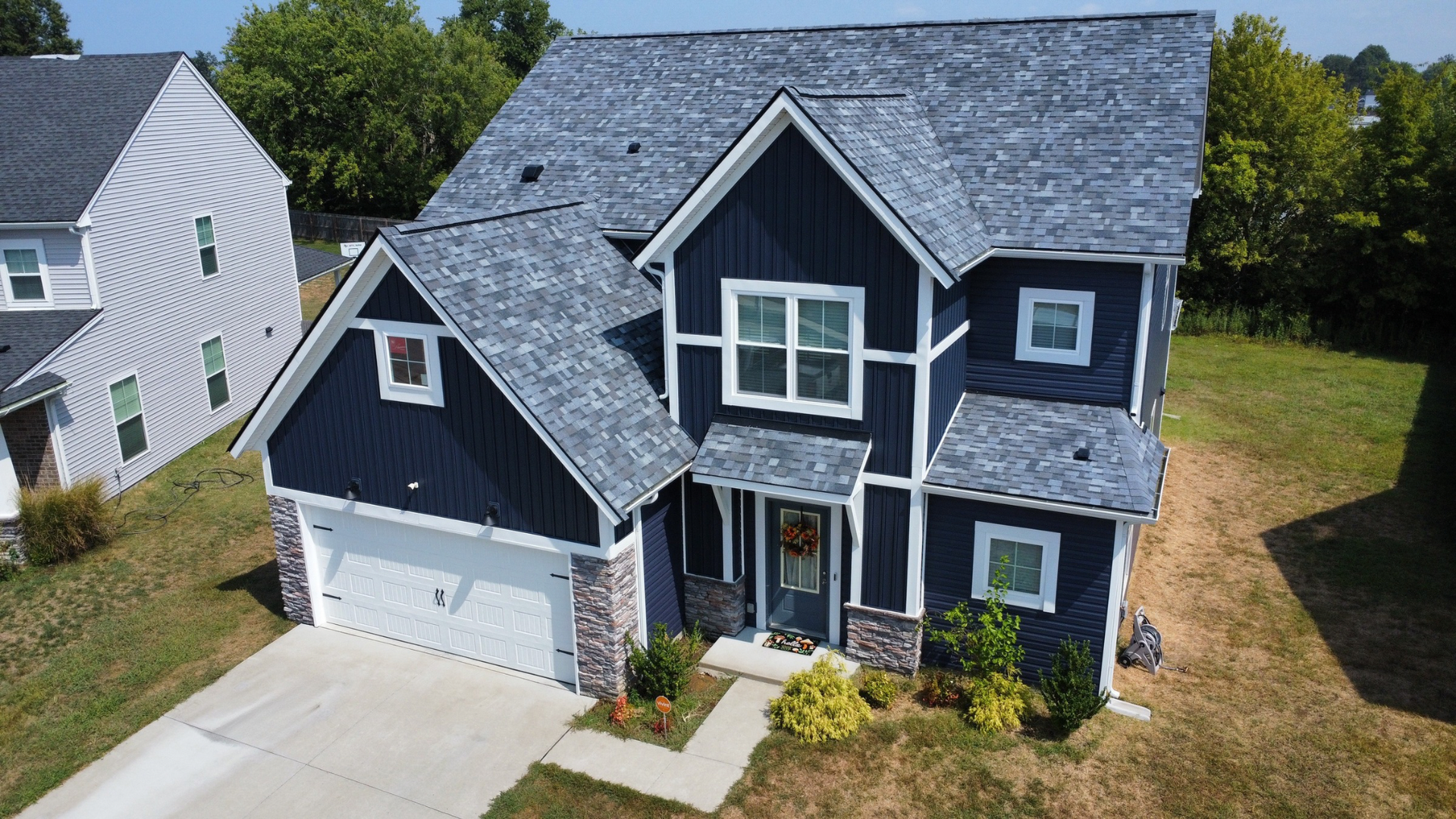A roof with shingles being installed on it.