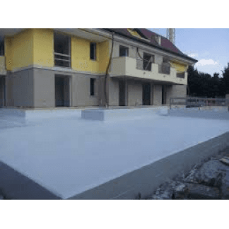 vista di una casa con facciata gialla e grigia