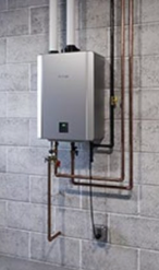 A water heater is attached to a brick wall