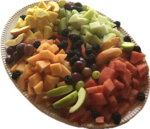 a white plate filled with different types of fruit — Mary Esther, FL — Bella Donna Catering