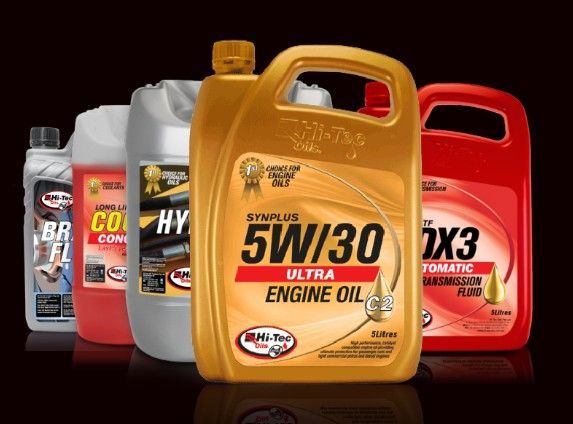 A Hand Holds A Gray Plastic Motor Oil Bottle — Eastcoast Bearings & Hydraulics in South Grafton, NSW