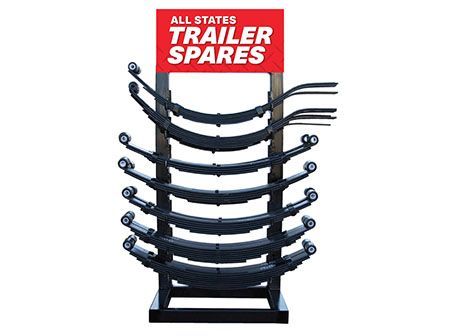 A Blue Hydraulic Jack Supports A Car In A Repair Shop — Eastcoast Bearings & Hydraulics in Yamba, NSW