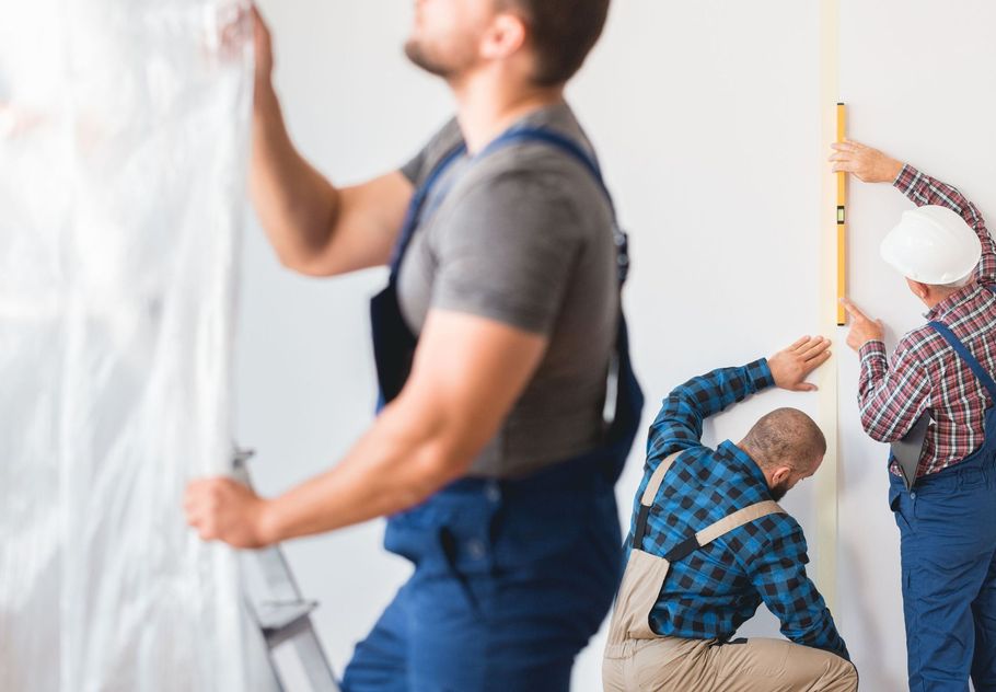 two painters preparing to paint the interior of an Oklahoma house