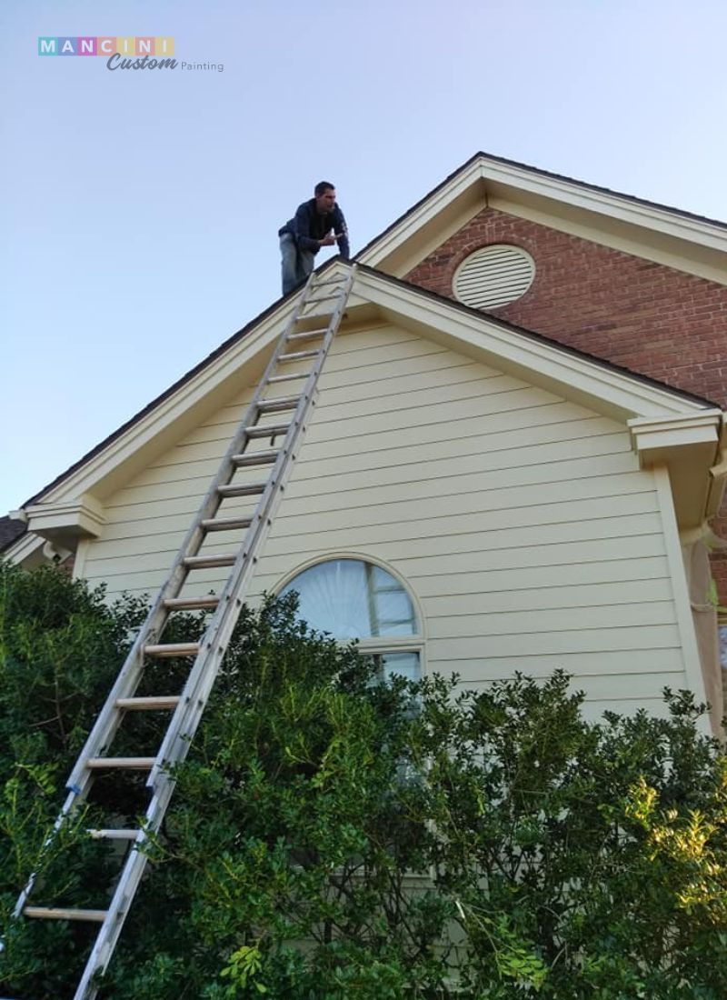 Interior painting contractor at work in Stillwater, OK