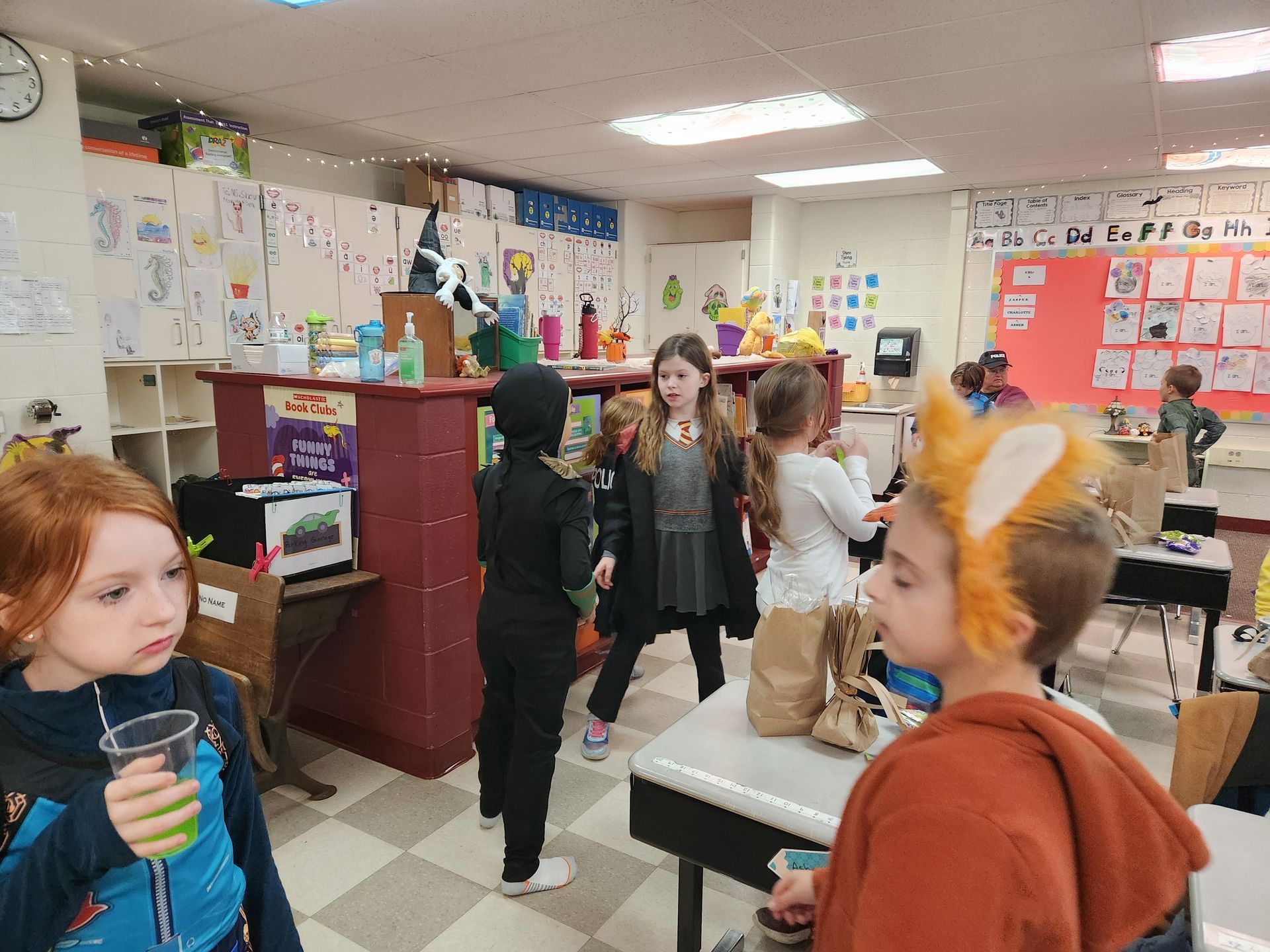 Elementary students dressed in Halloween costumes