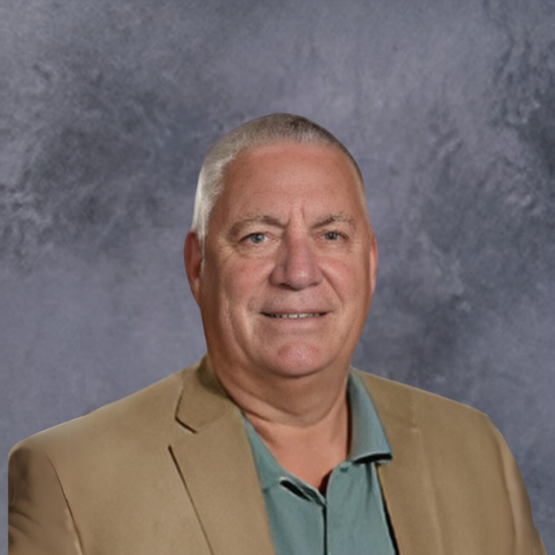 A photo of the superintendent smiling.