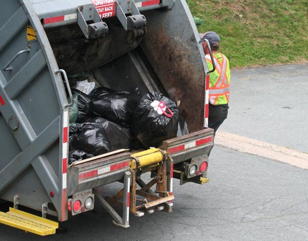Garbage Truck Full of Garbage — Lock Haven, PA — Love Disposal, Inc.