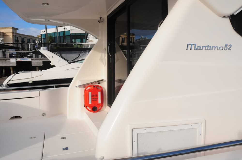 A white boat with the name maritimo52 on the side LIFECELL products