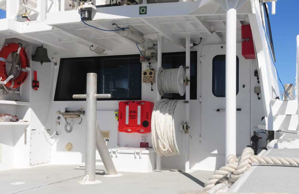 A white boat with a life preserver on the deck LIFECELL products