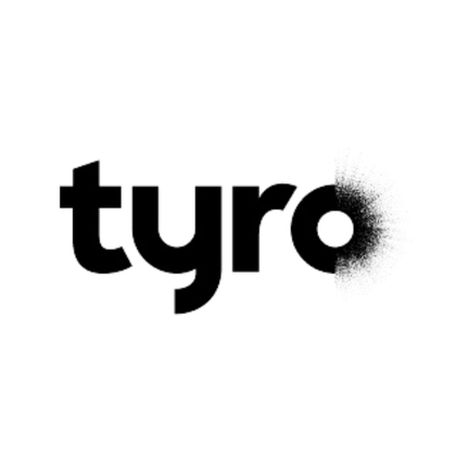 The word tyro is spray painted on a white background.