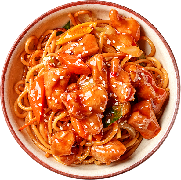 A bowl of noodles with chicken and sauce on a white background.