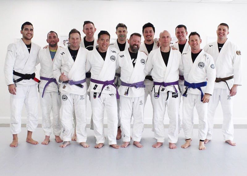 Adults practicing Brazilian Jiu Jitsu at Breathe Jiu Jitsu in Yaphank, NY, building confidence.