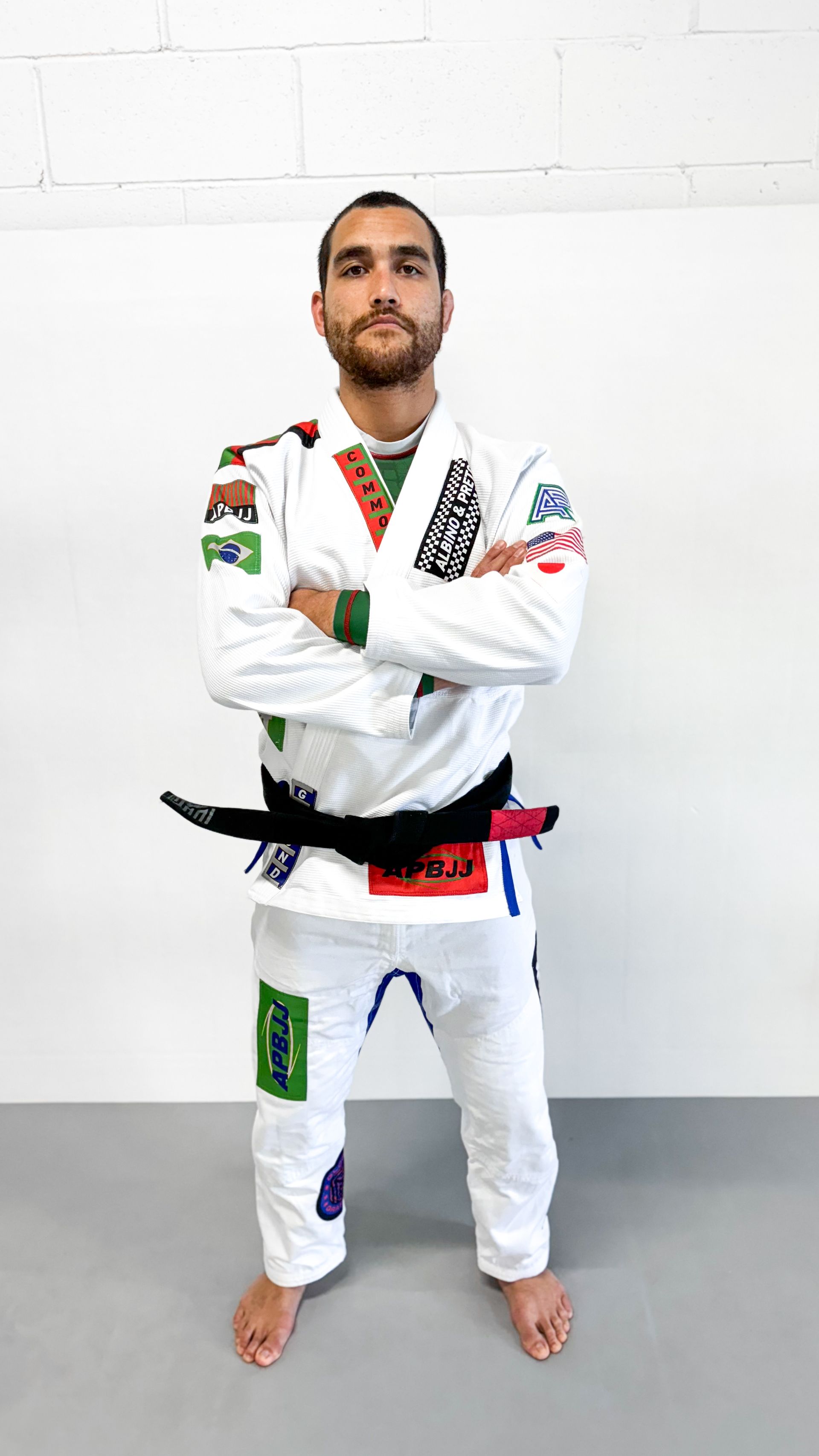 Partners drilling Jiu Jitsu transitions at Breathe Jiu Jitsu in Yaphank, NY, building calm focus and awareness.