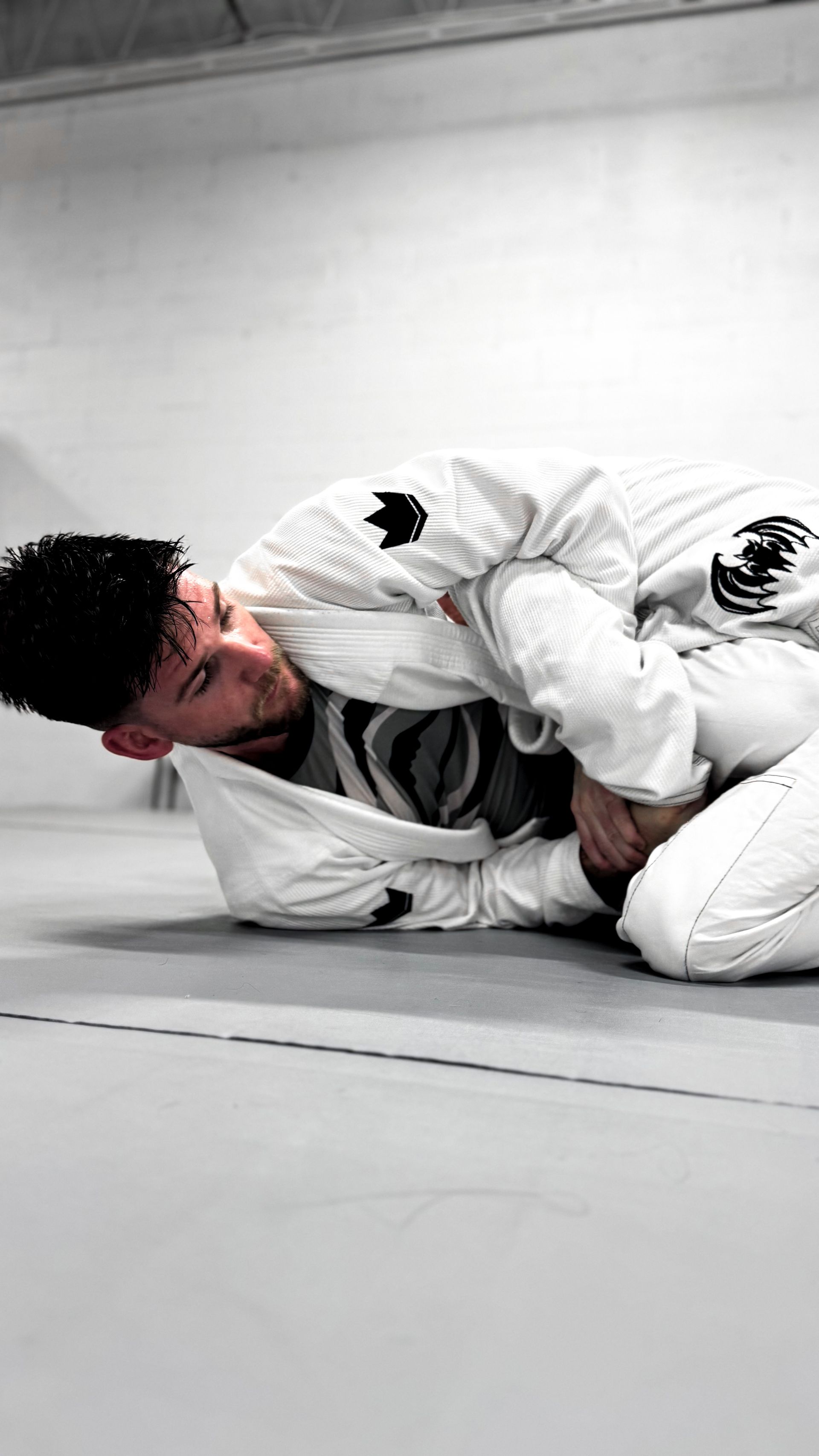 Professionals drilling Jiu Jitsu techniques at Breathe Jiu Jitsu in Yaphank, NY.